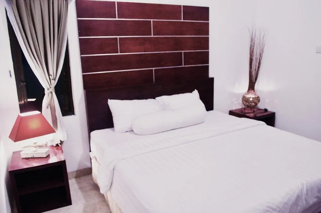 Cozy Palm Hotel Kuta Selatan